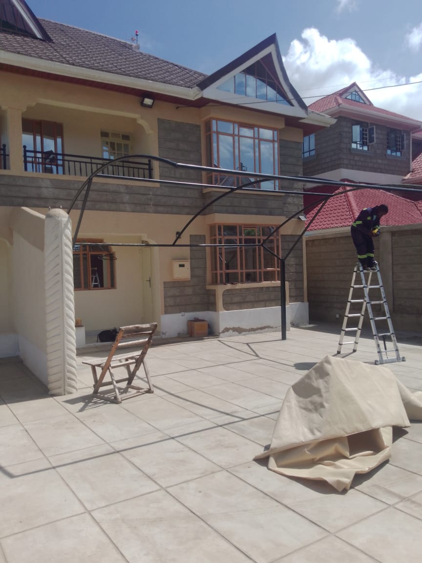 Curved Roof Car Shade Kenya Design