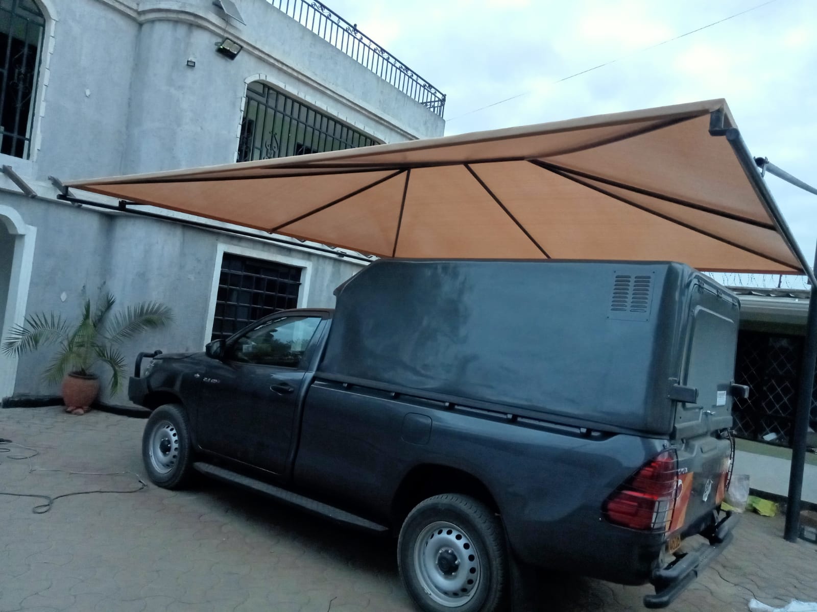 Ms. Vata - Pyramid Roof Car Shade & Pergola